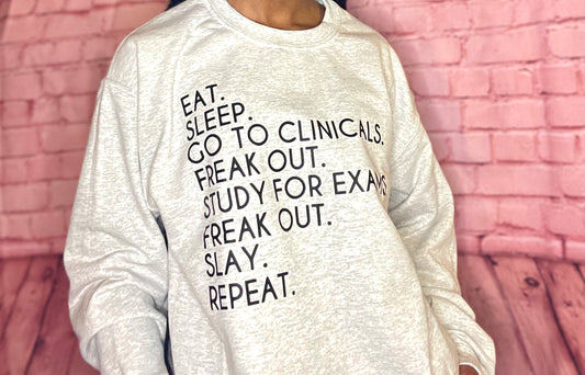 Eat Sleep Repeat Sweatshirt